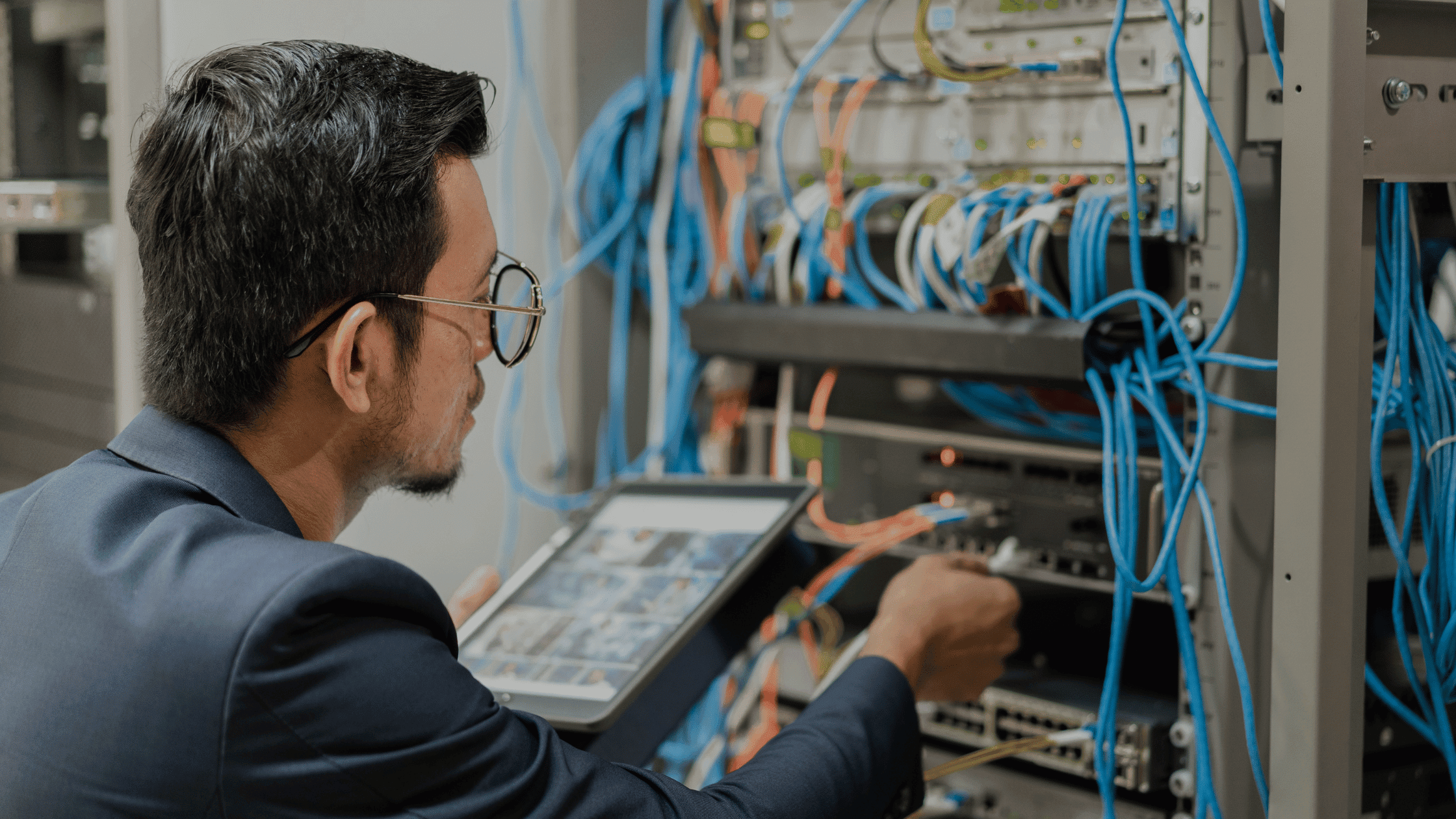 Structured cabling system devices: patch panels, network switches, PoE devices for smart office infrastructure.